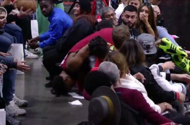 Kyle Lowry shaken up after tumbling into the stands 😮 | NBA on ESPN