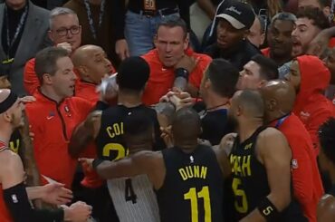 John Collins gets heated with Bulls assistant coach after Collin Sexton got into it with bench 😳