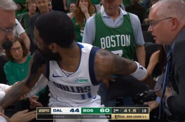 Kyrie Irving gets into it with Celtics fan after diving into crowd "f**k is wrong with you"