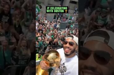 Jayson Tatum still with the Larry O'Brien trophy at the Celtics championship parade ☘️