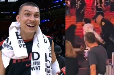 Tyler Herro gets distracted during interview by fans fighting in the crowd 😂